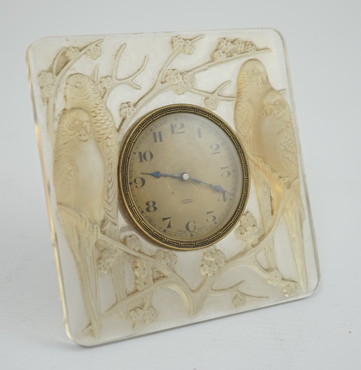 A R. Lalique Quatre Perruches opalescent glass strut timepiece